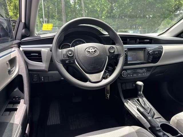 2015 Super White Toyota Corolla LE FWD Sedan