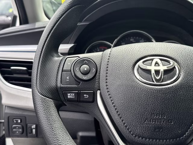 2015 Super White Toyota Corolla LE FWD Sedan