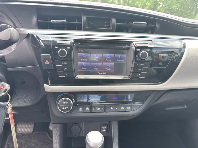 2015 Super White Toyota Corolla LE FWD Sedan