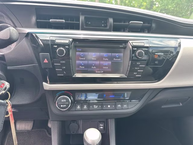 2015 Super White Toyota Corolla LE FWD Sedan