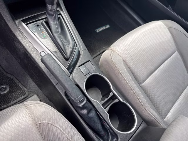 2015 Super White Toyota Corolla LE FWD Sedan