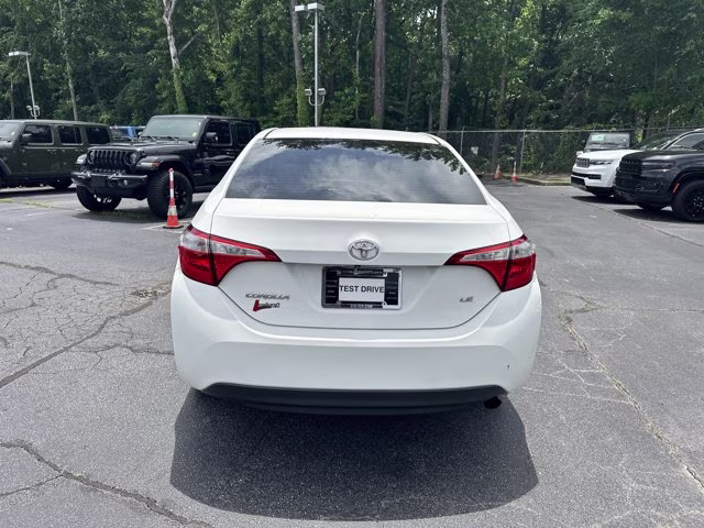 2015 Super White Toyota Corolla LE FWD Sedan