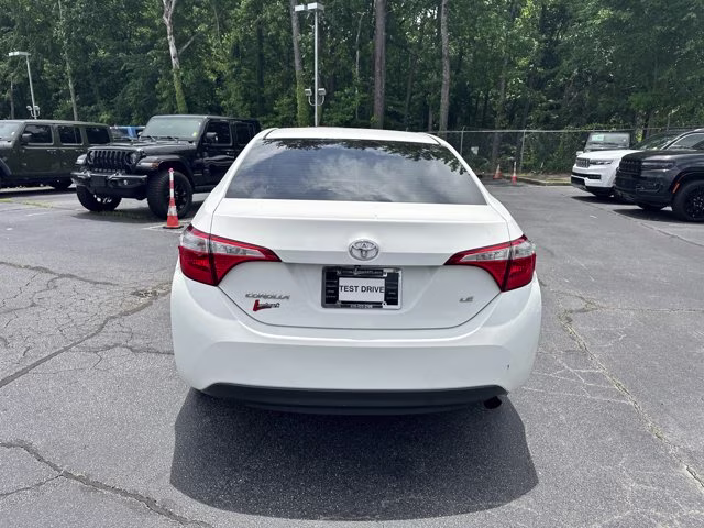 2015 Super White Toyota Corolla LE FWD Sedan