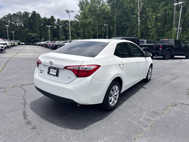 2015 Super White Toyota Corolla LE FWD Sedan