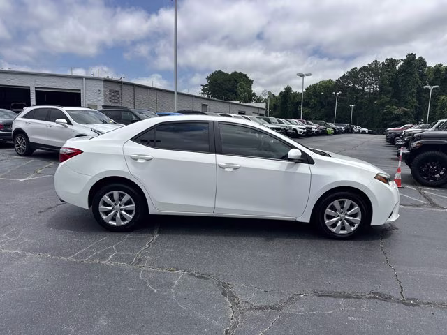 2015 Super White Toyota Corolla LE FWD Sedan