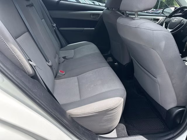 2015 Super White Toyota Corolla LE FWD Sedan