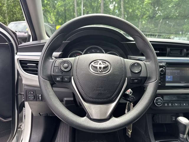 2015 Super White Toyota Corolla LE FWD Sedan