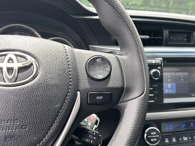 2015 Super White Toyota Corolla LE FWD Sedan