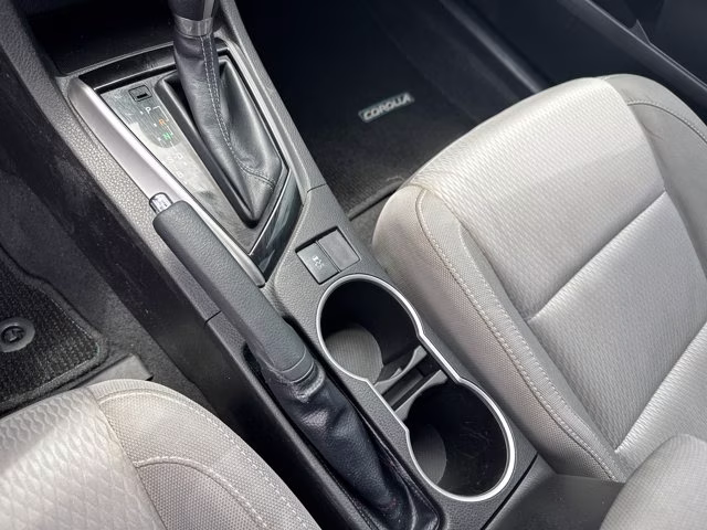 2015 Super White Toyota Corolla LE FWD Sedan