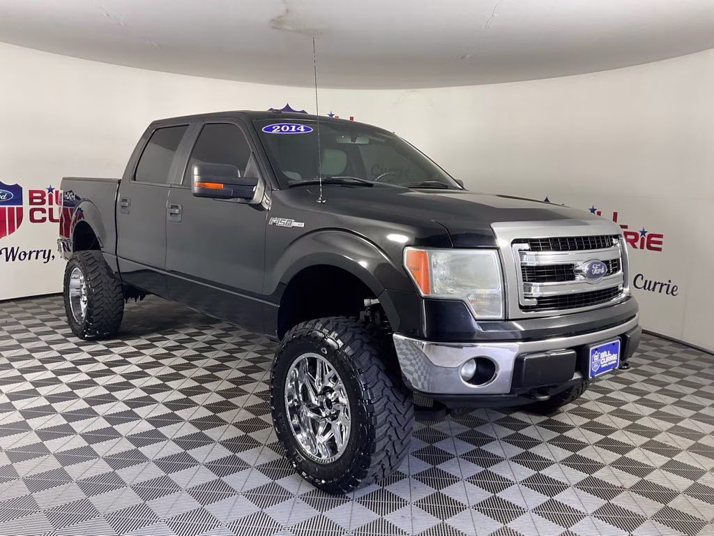 2014 Tuxedo Black Metallic Ford F-150 XLT 4X4 Truck
