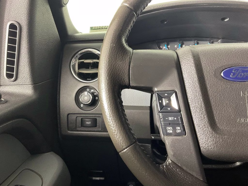 2014 Tuxedo Black Metallic Ford F-150 XLT 4X4 Truck