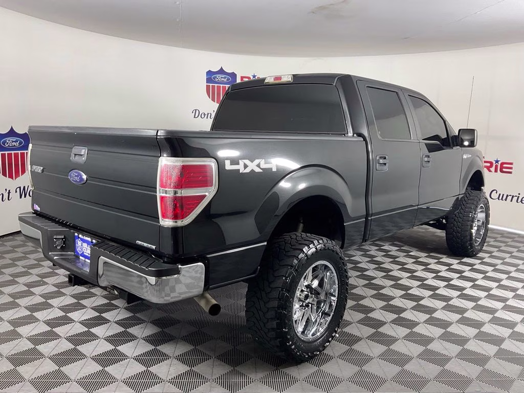 2014 Tuxedo Black Metallic Ford F-150 XLT 4X4 Truck