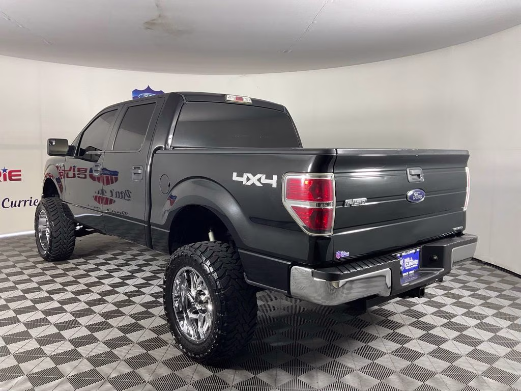 2014 Tuxedo Black Metallic Ford F-150 XLT 4X4 Truck