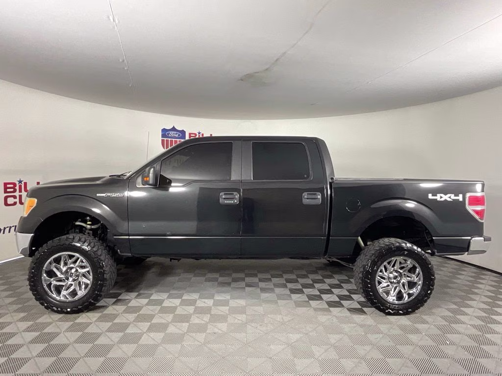 2014 Tuxedo Black Metallic Ford F-150 XLT 4X4 Truck