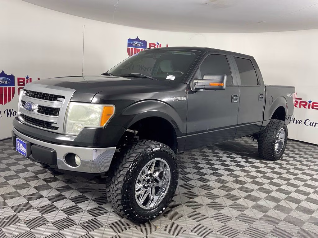 2014 Tuxedo Black Metallic Ford F-150 XLT 4X4 Truck