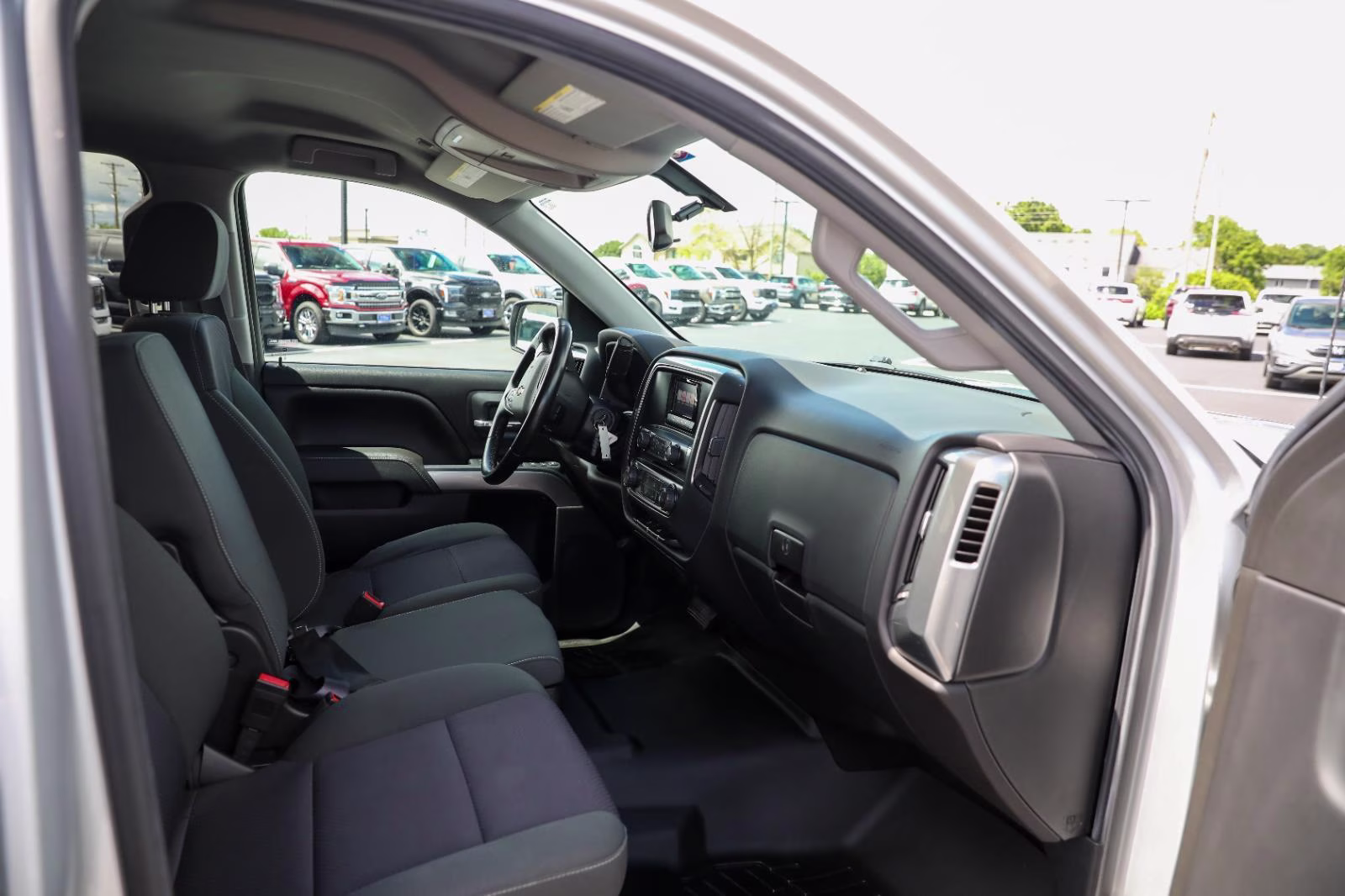 2015 Silver Ice Metallic Chevrolet Silverado 1500 LT 4X4 Truck