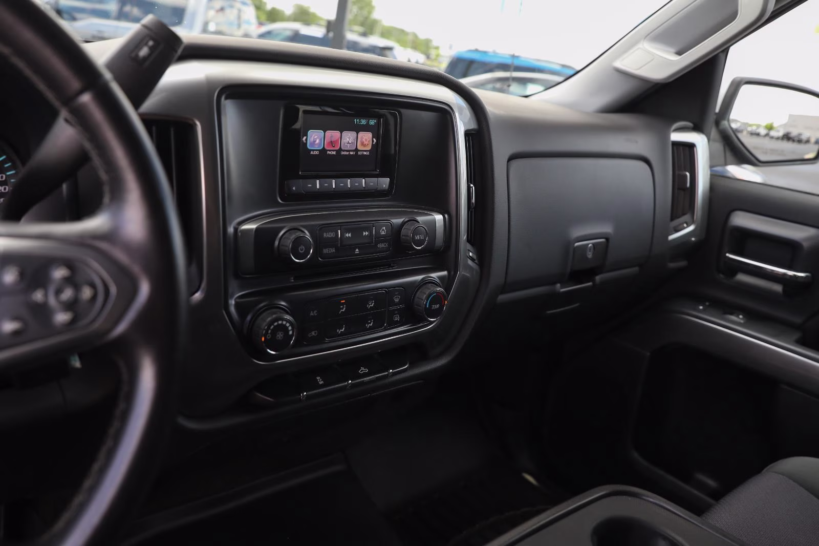 2015 Silver Ice Metallic Chevrolet Silverado 1500 LT 4X4 Truck