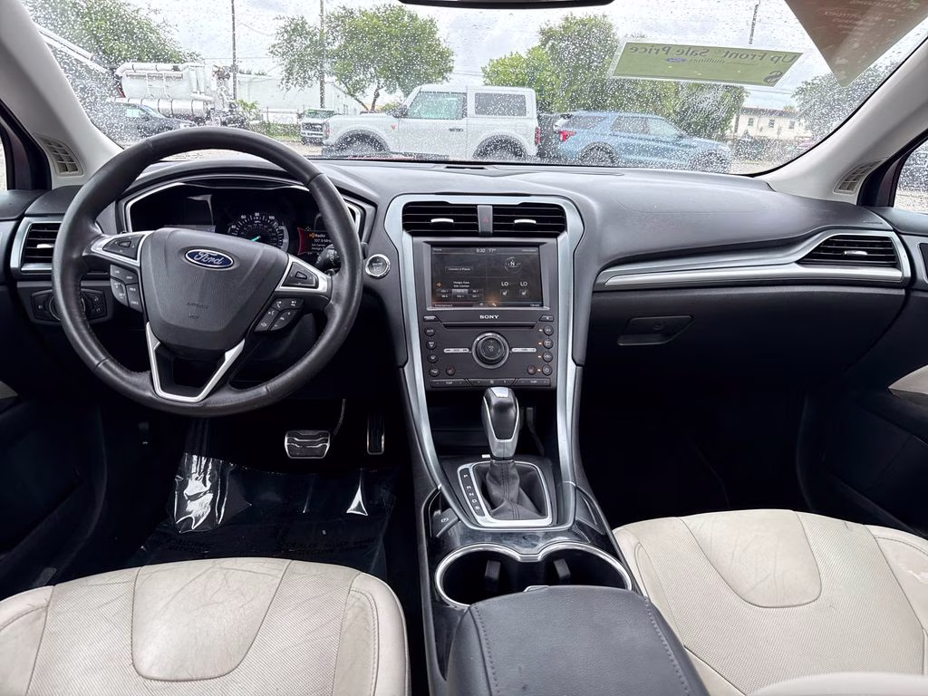 2016 Ruby Red Metallic Ford Fusion Titanium FWD Sedan
