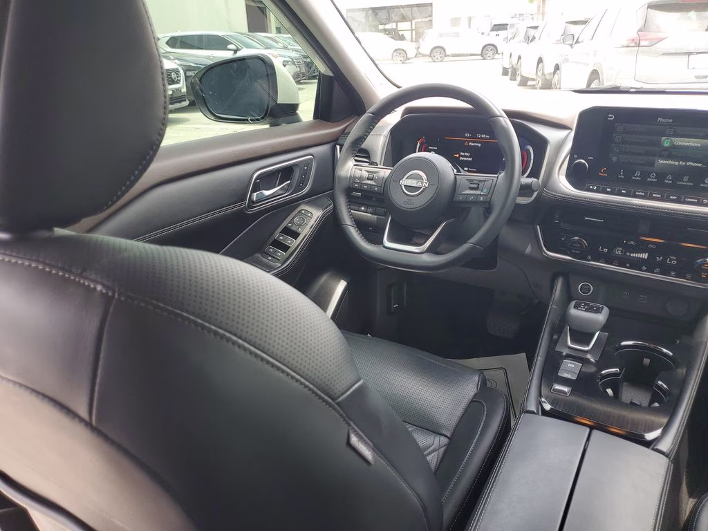 2023 Pearl White Tricoat Nissan Rogue Platinum FWD SUV