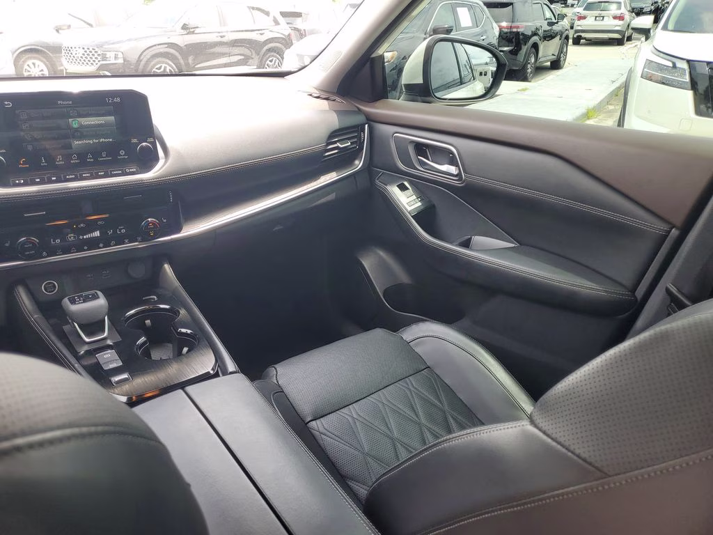 2023 Pearl White Tricoat Nissan Rogue Platinum FWD SUV