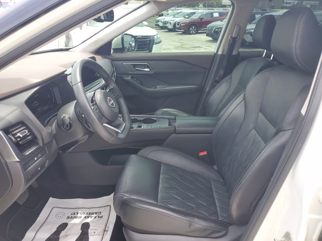 2023 Pearl White Tricoat Nissan Rogue Platinum FWD SUV