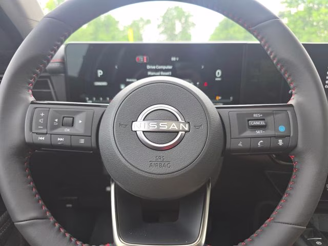 2026 Gun Metallic/Scarlet Ember Tintcoat Nissan Kicks SR AWD SUV