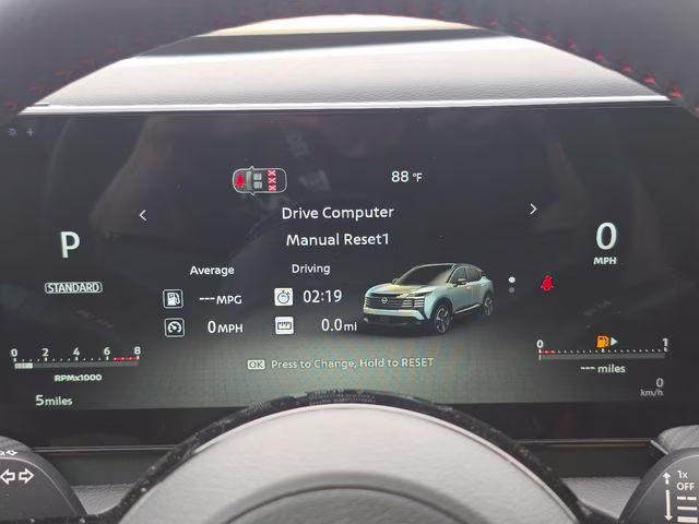 2026 Gun Metallic/Scarlet Ember Tintcoat Nissan Kicks SR AWD SUV