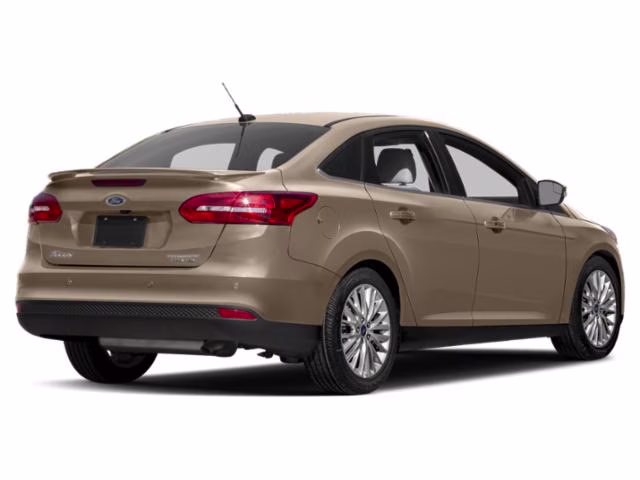 2018 White Gold Metallic Ford Focus Titanium FWD Sedan