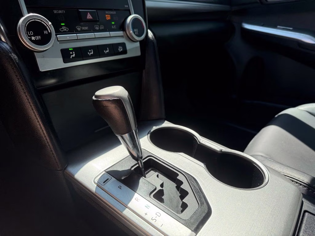 2014 Classic Silver Metallic Toyota Camry SE Sport FWD Sedan
