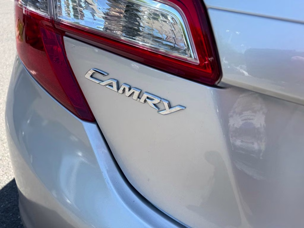 2014 Classic Silver Metallic Toyota Camry SE Sport FWD Sedan