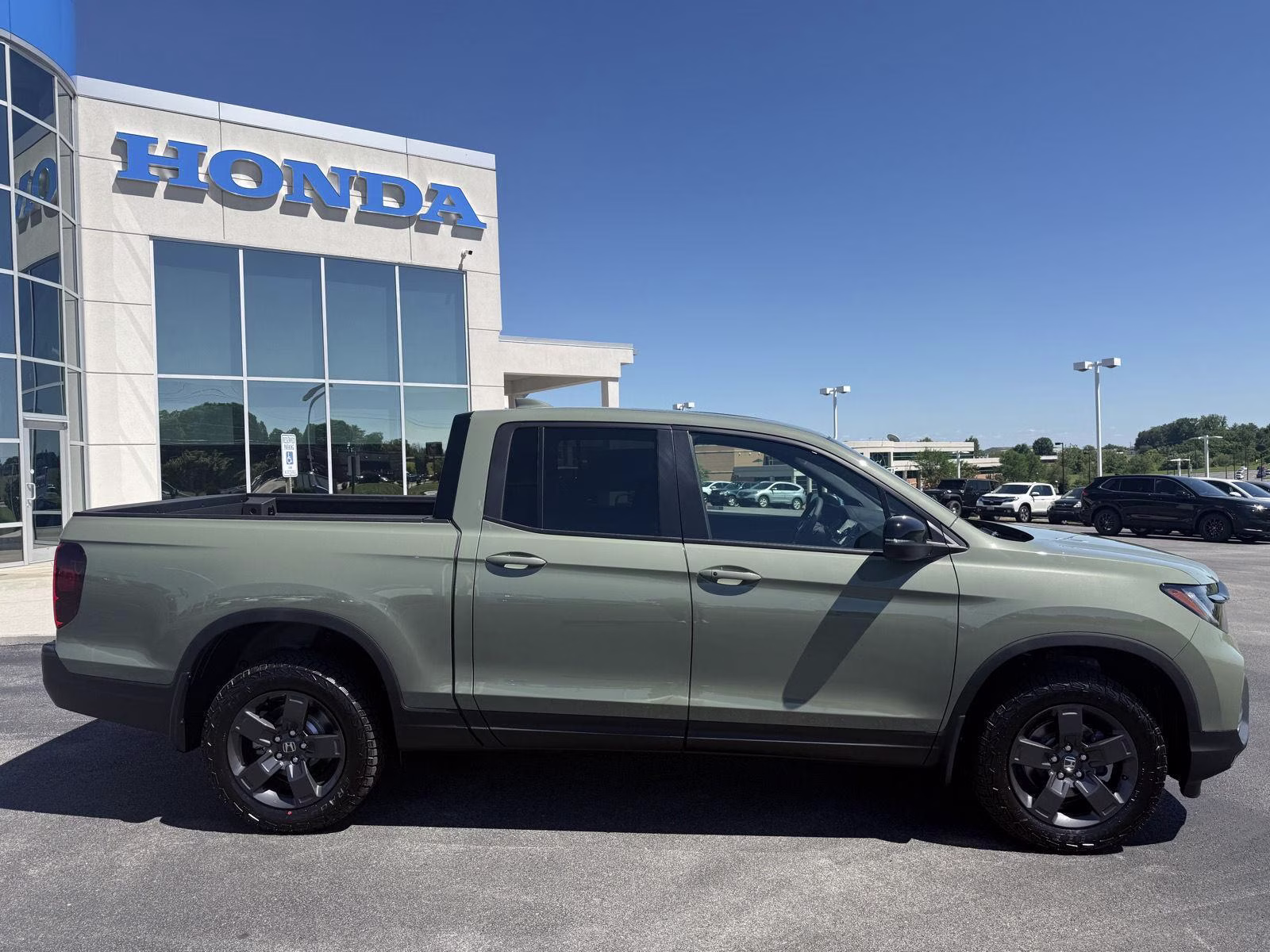 2026 Ash Green Metallic Honda Ridgeline TrailSport AWD Truck