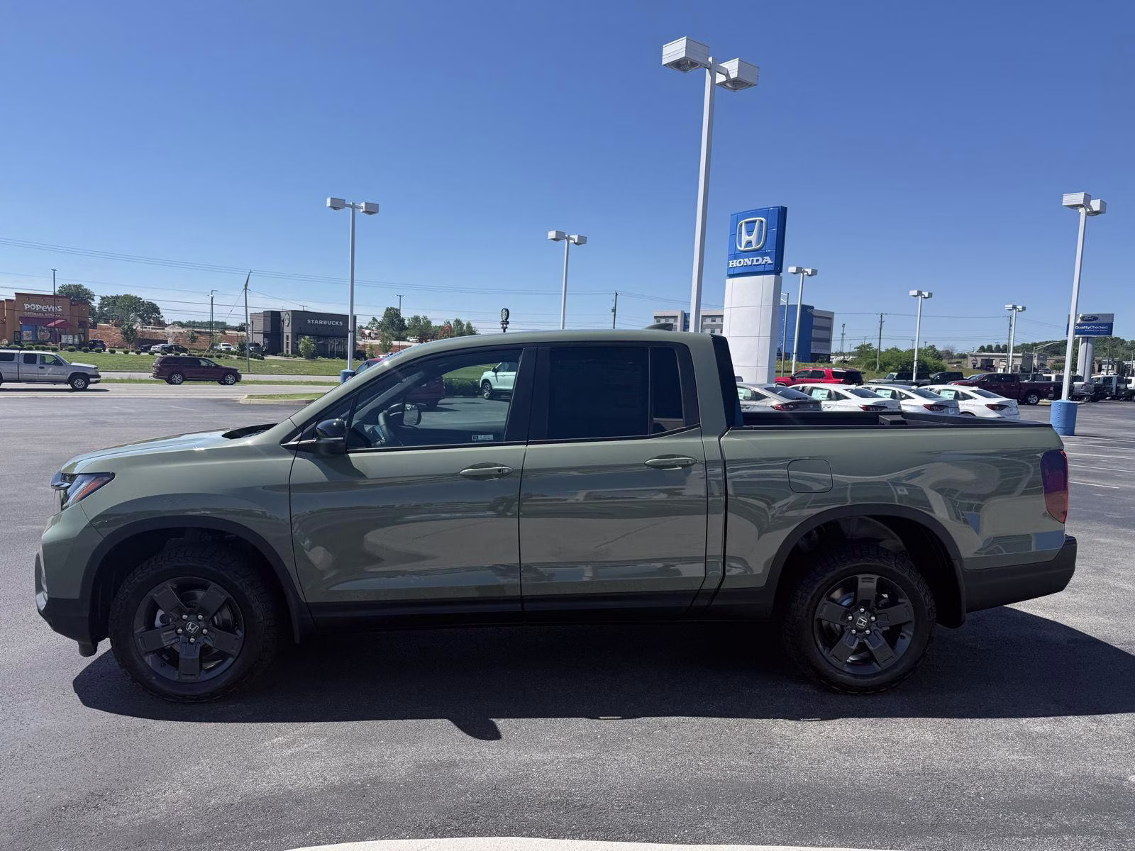 2026 Ash Green Metallic Honda Ridgeline TrailSport AWD Truck