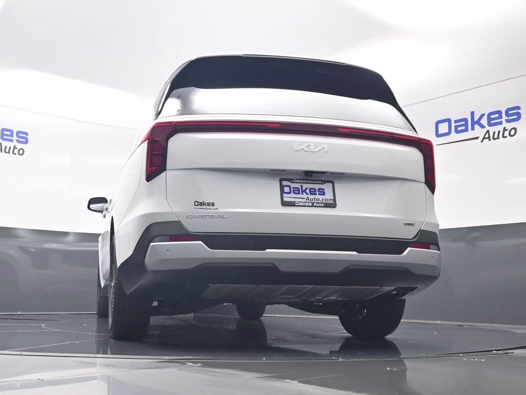 2026 Snow White Pearl Kia Carnival Hybrid EX FWD Van