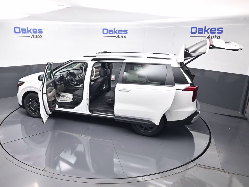 2026 Snow White Pearl Kia Carnival Hybrid EX FWD Van
