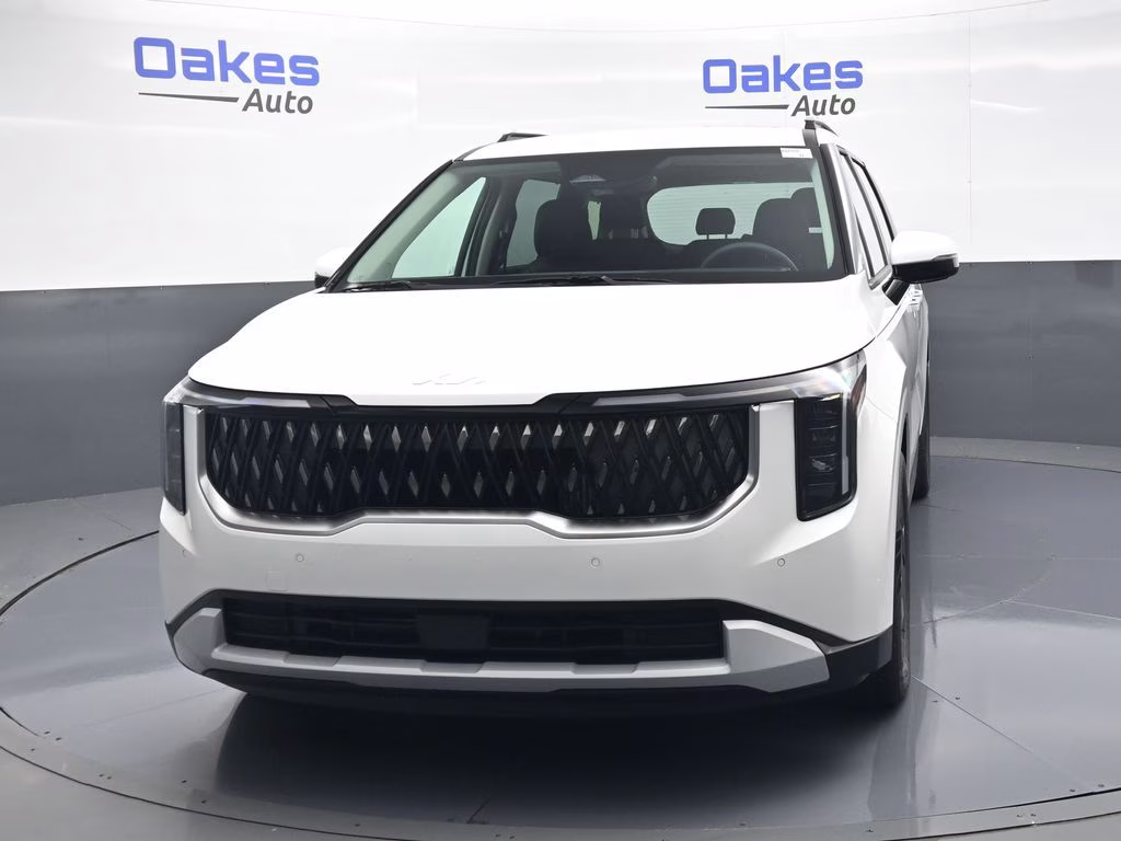2026 Snow White Pearl Kia Carnival Hybrid EX FWD Van