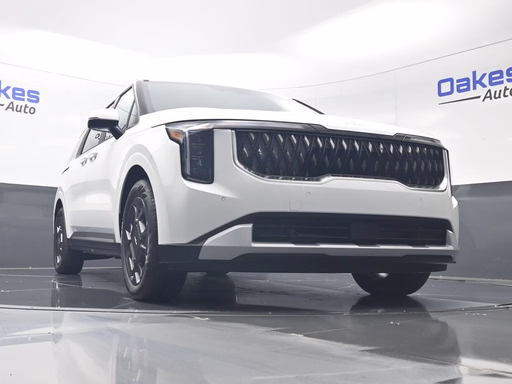 2026 Snow White Pearl Kia Carnival Hybrid EX FWD Van
