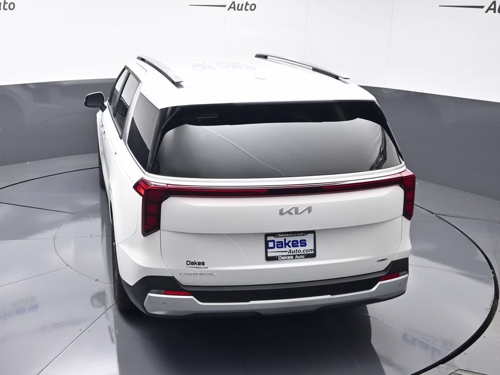 2026 Snow White Pearl Kia Carnival Hybrid EX FWD Van