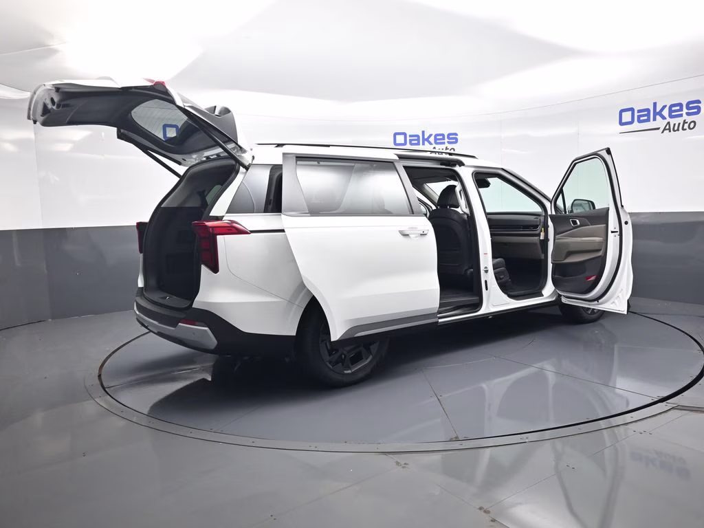 2026 Snow White Pearl Kia Carnival Hybrid EX FWD Van