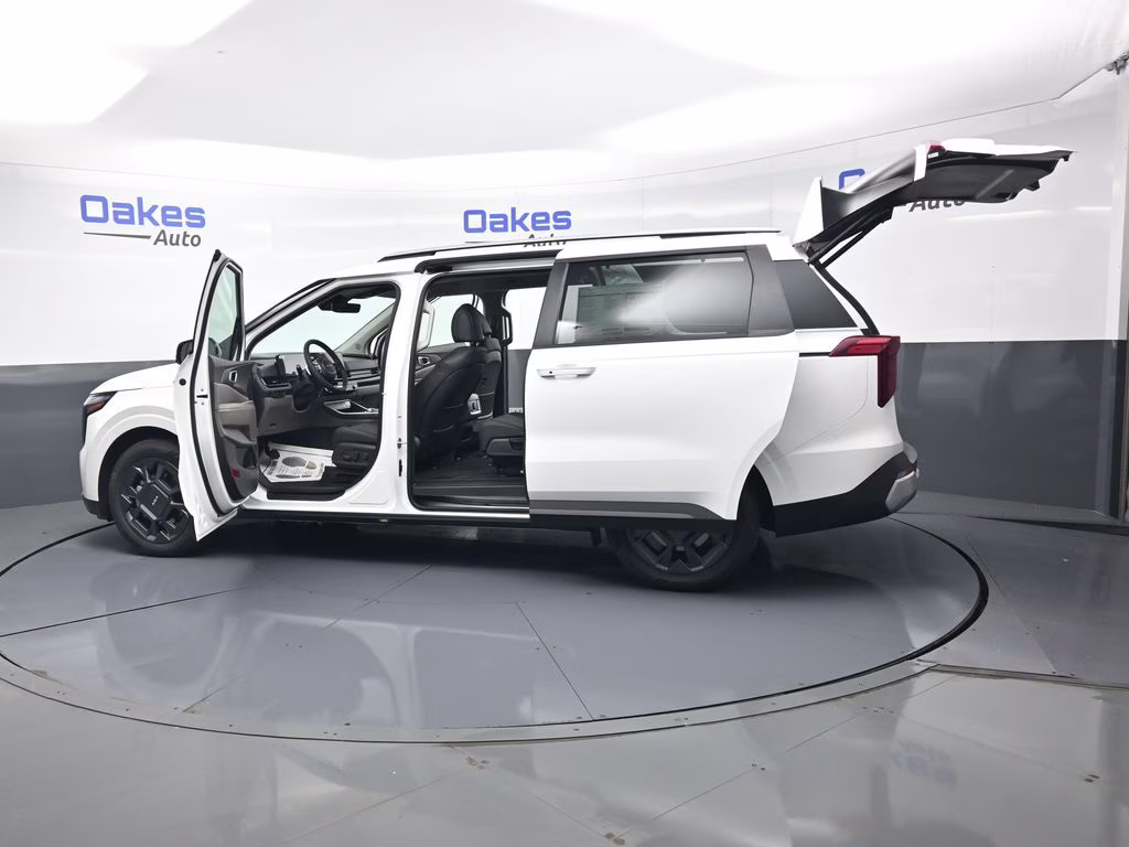 2026 Snow White Pearl Kia Carnival Hybrid EX FWD Van