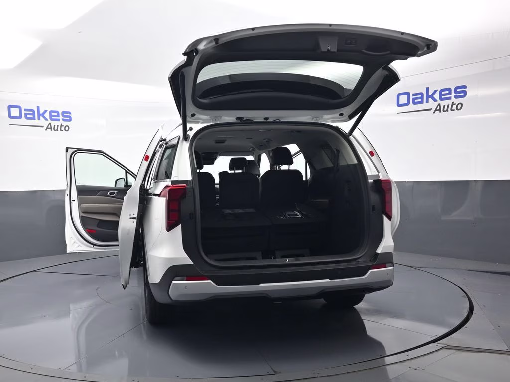 2026 Snow White Pearl Kia Carnival Hybrid EX FWD Van