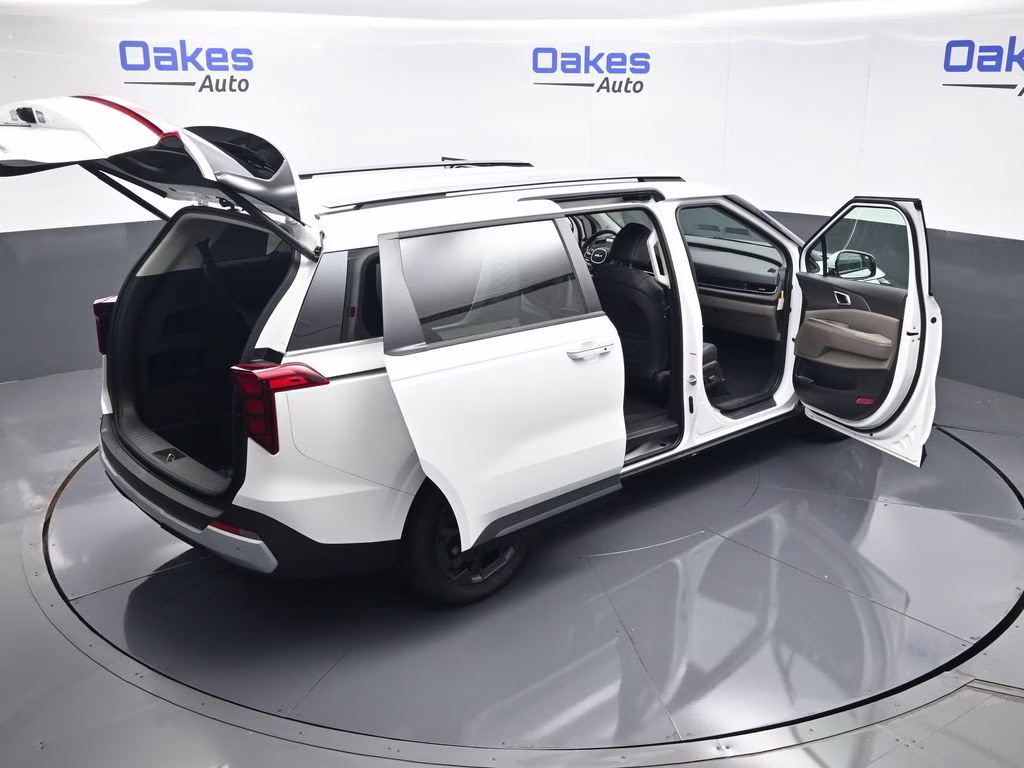 2026 Snow White Pearl Kia Carnival Hybrid EX FWD Van