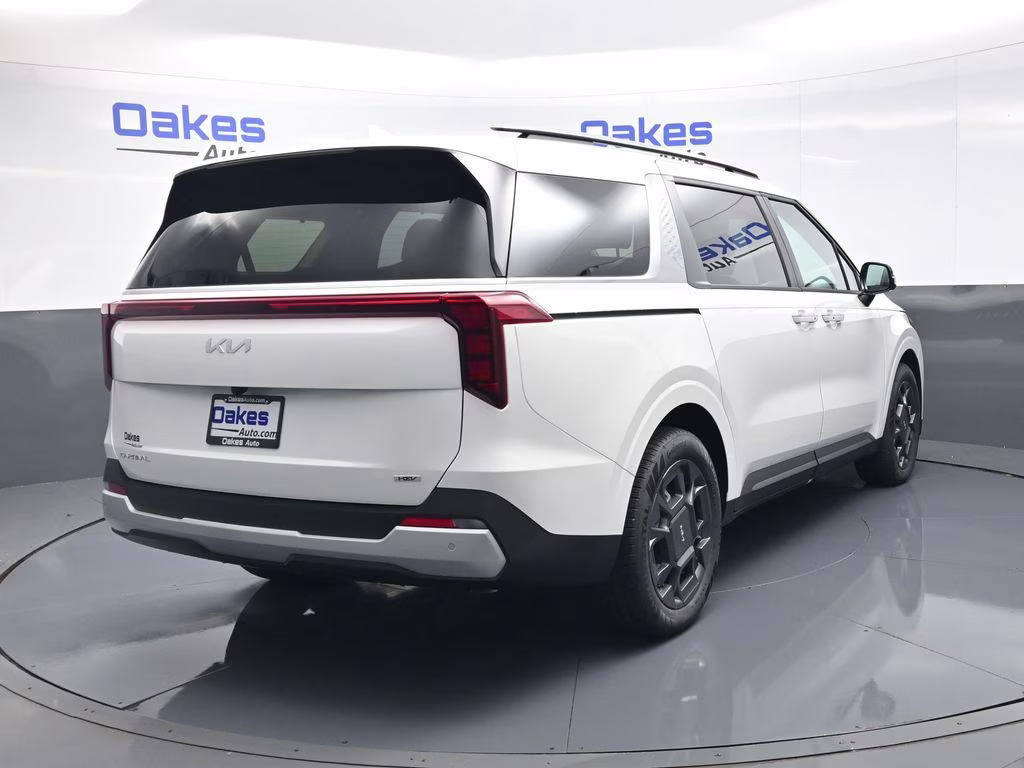 2026 Snow White Pearl Kia Carnival Hybrid EX FWD Van