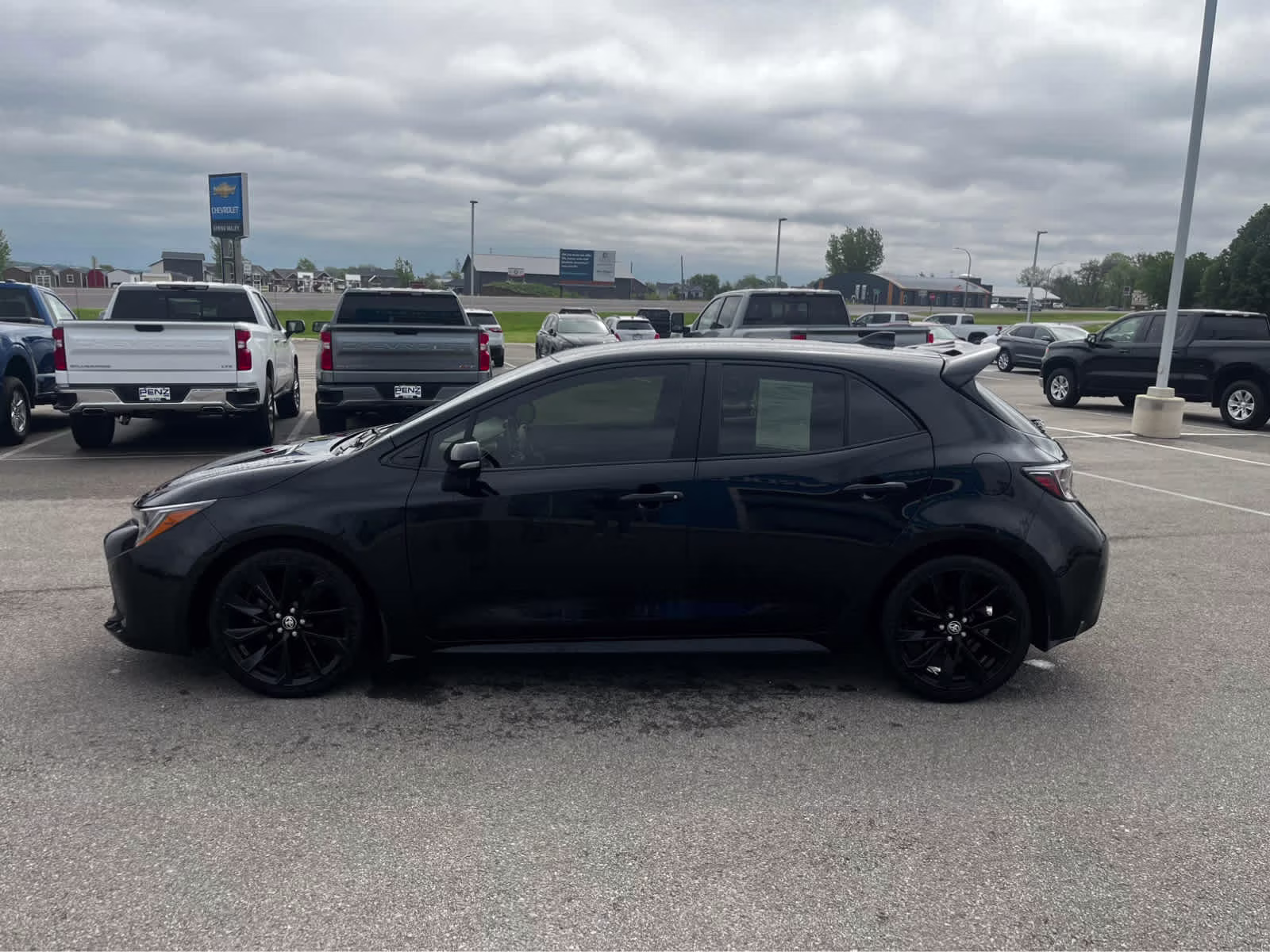 2021 Midnight Black Metallic Toyota Corolla Hatchback SE FWD Sedan