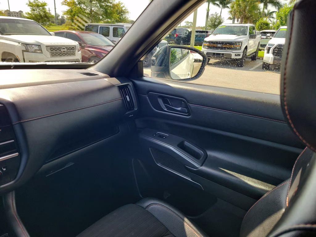 2023 Pearl White Tricoat/Super Black Nissan Pathfinder Rock Creek 4X4 SUV