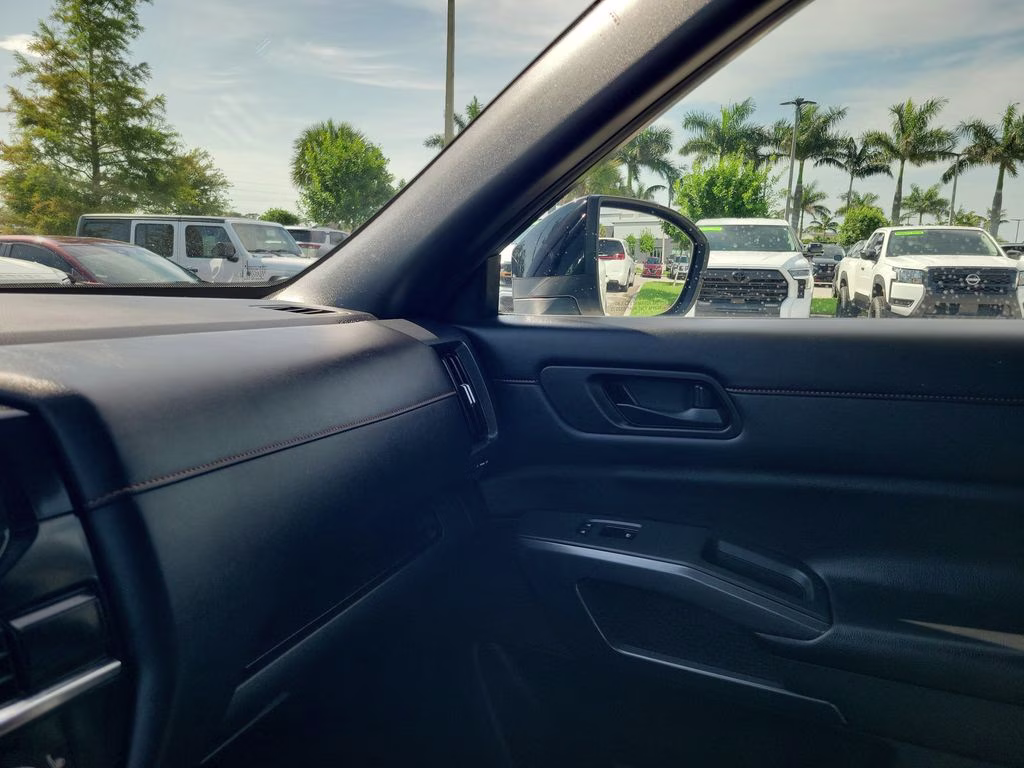 2023 Pearl White Tricoat/Super Black Nissan Pathfinder Rock Creek 4X4 SUV