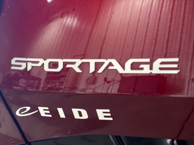 2023 Dawning Red Kia Sportage SX-Prestige AWD SUV