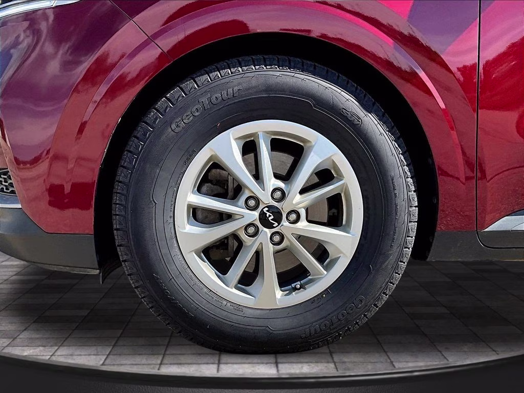 2024 Flare Red Kia Carnival LX Seat Package FWD Van
