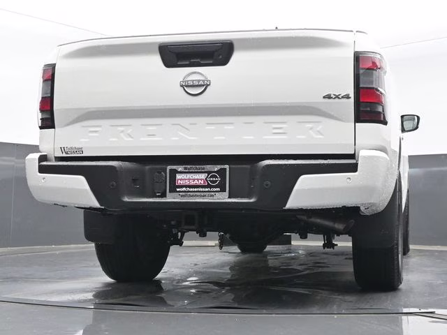 2026 Glacier White Nissan Frontier SV 4X4 Truck