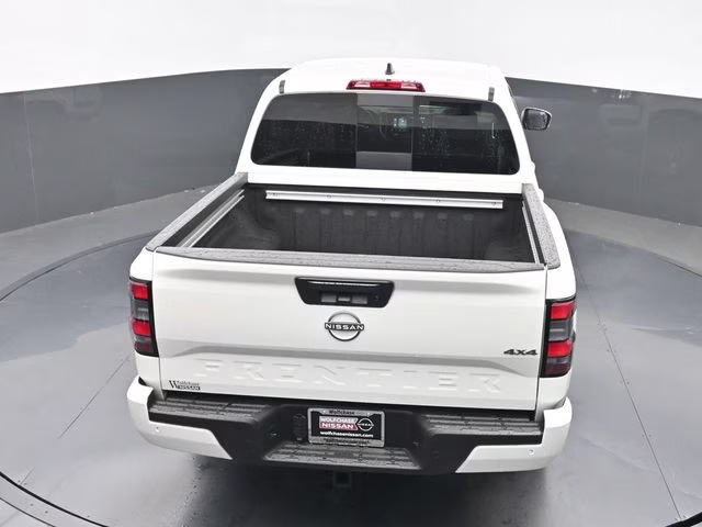 2026 Glacier White Nissan Frontier SV 4X4 Truck