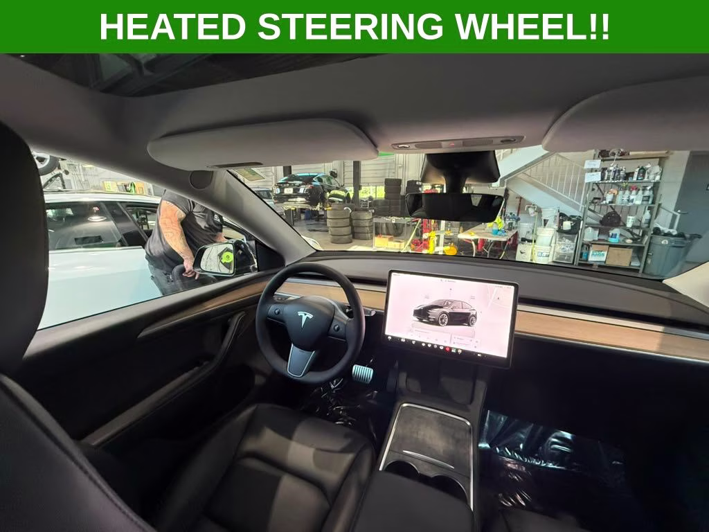 2023 Solid Black Tesla Model Y Long Range AWD SUV